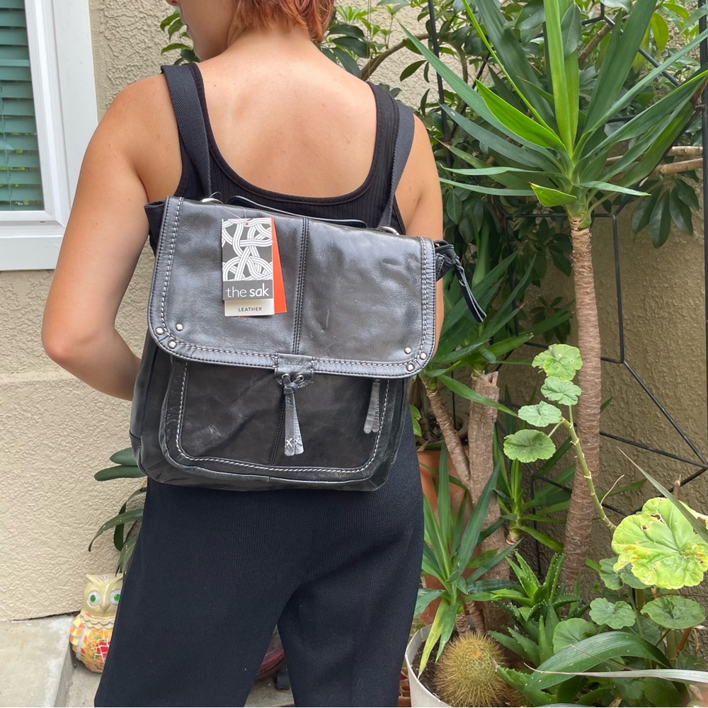New black/silver The SAK distressed leather backpack/massager bag